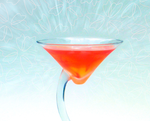 red cocktail with petal background